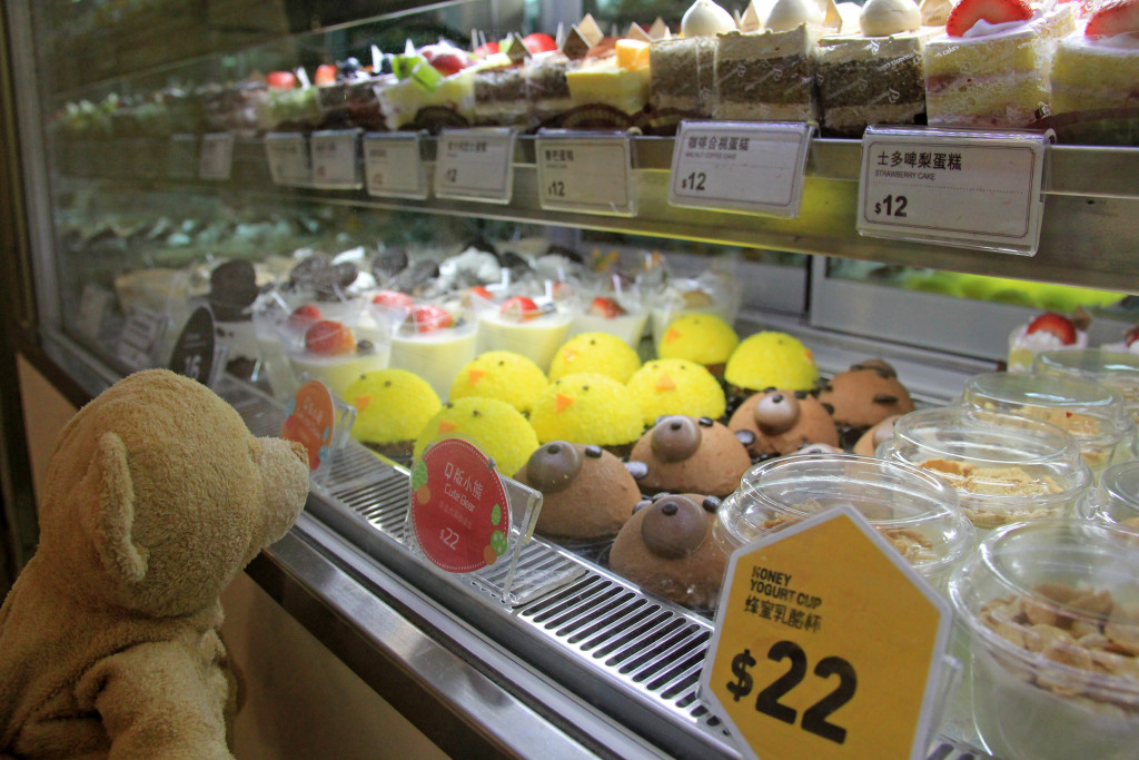 Cute animal-face cakes on display.