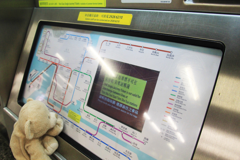 Woody figuring out map of MTR routes.