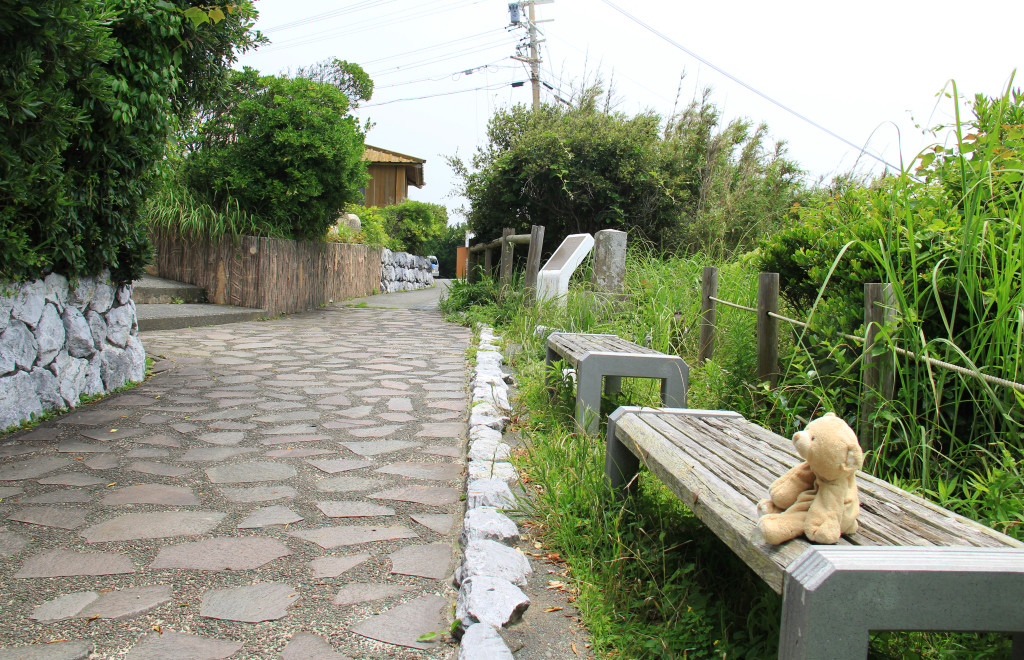 Lush greenery and cute pathways surrounding the lighthouse.