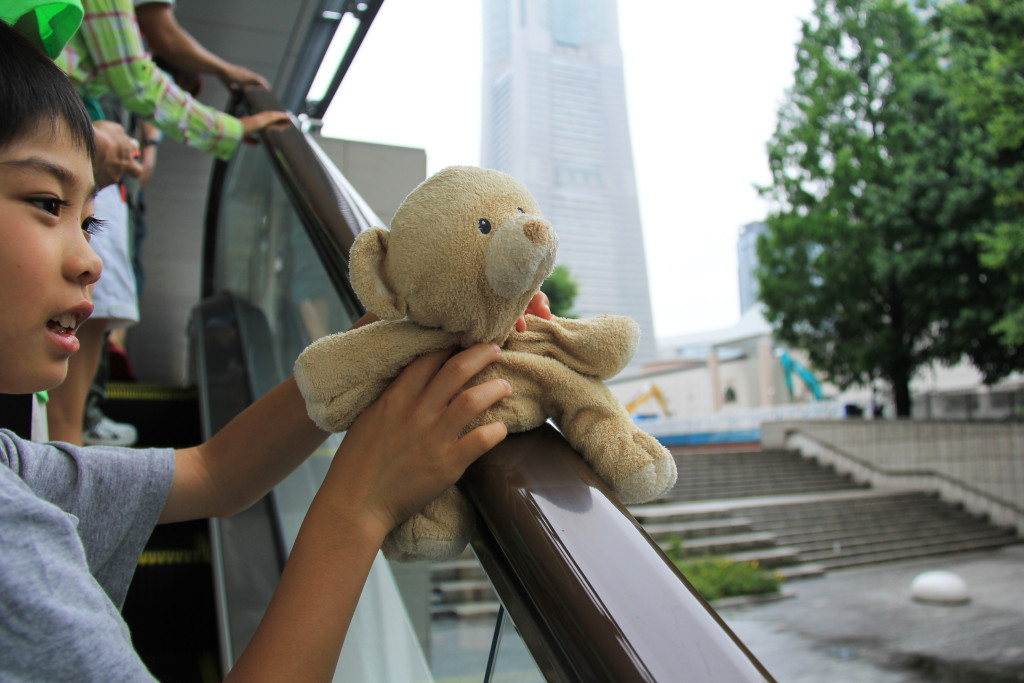 Up the escalator with my cousin Takuya.