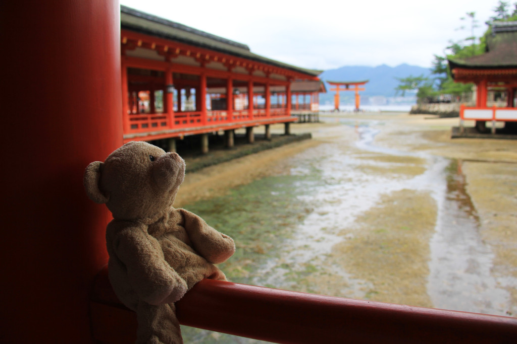 View of the shrine at low tide and the great Torii in the distance.