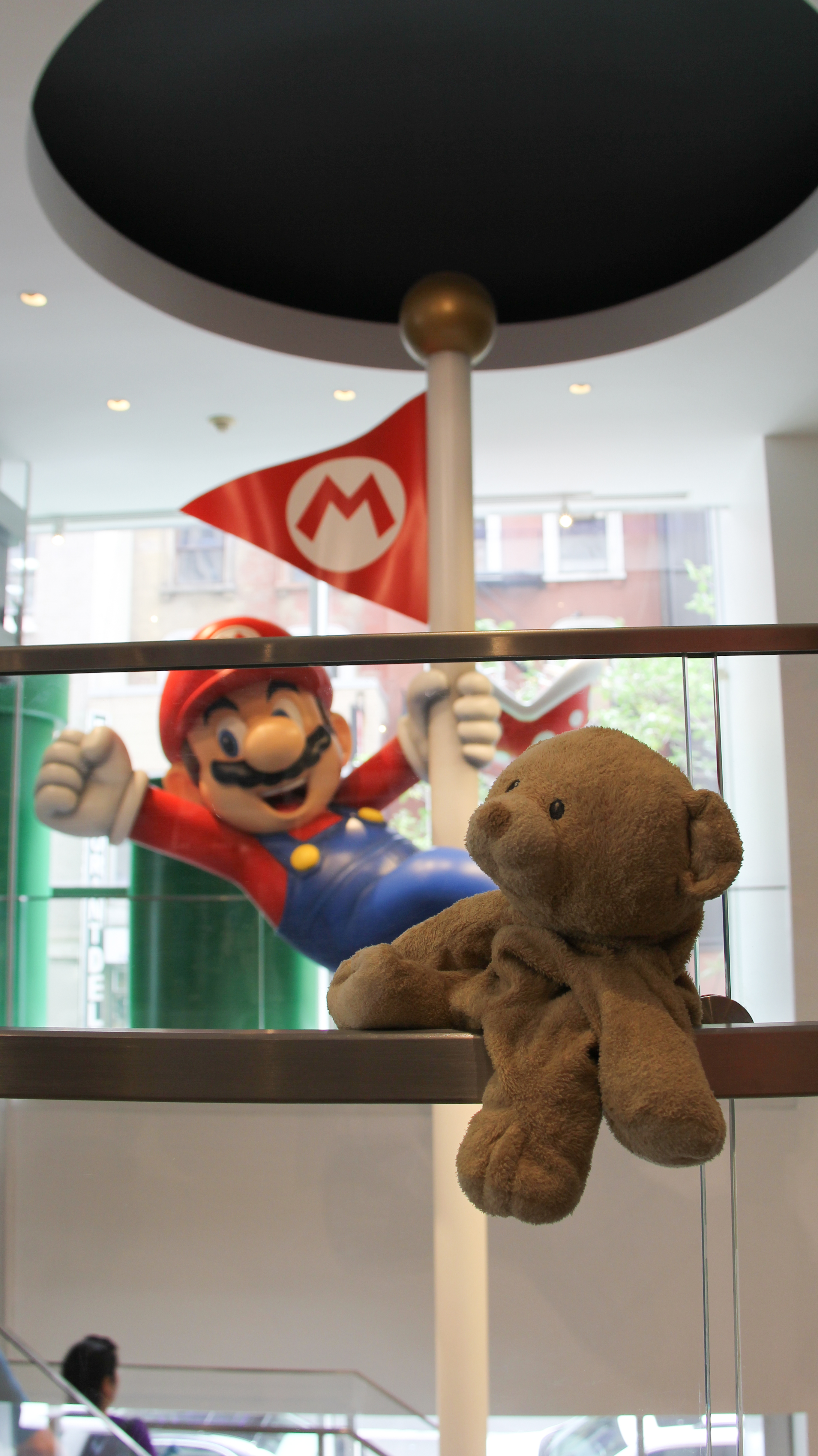 Woody and Mario inside Nintendo NY.